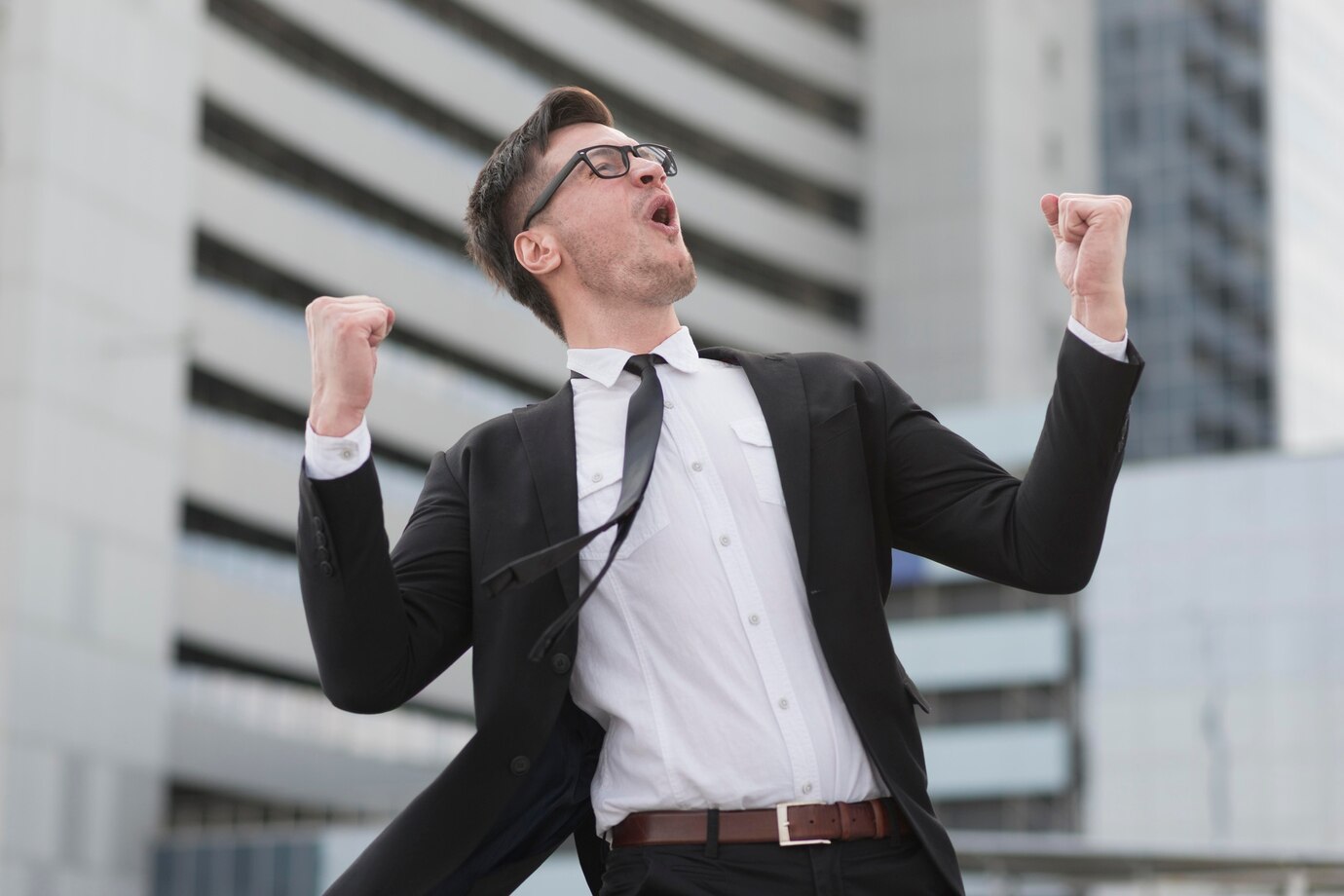 low-angle-modern-man-happy_23-2148514875.jpg