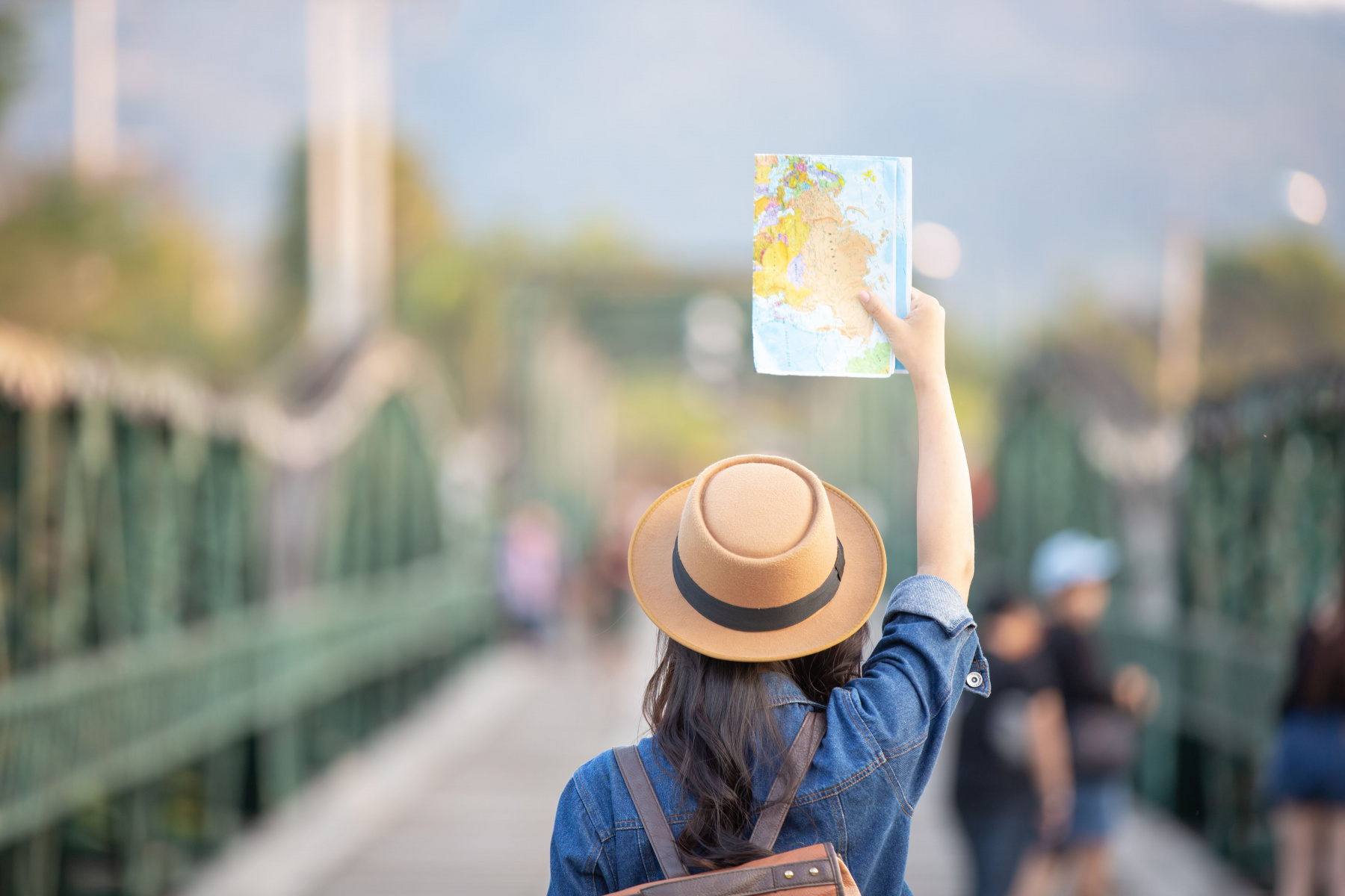 female-tourists-hand-have-happy-travel-map.jpg