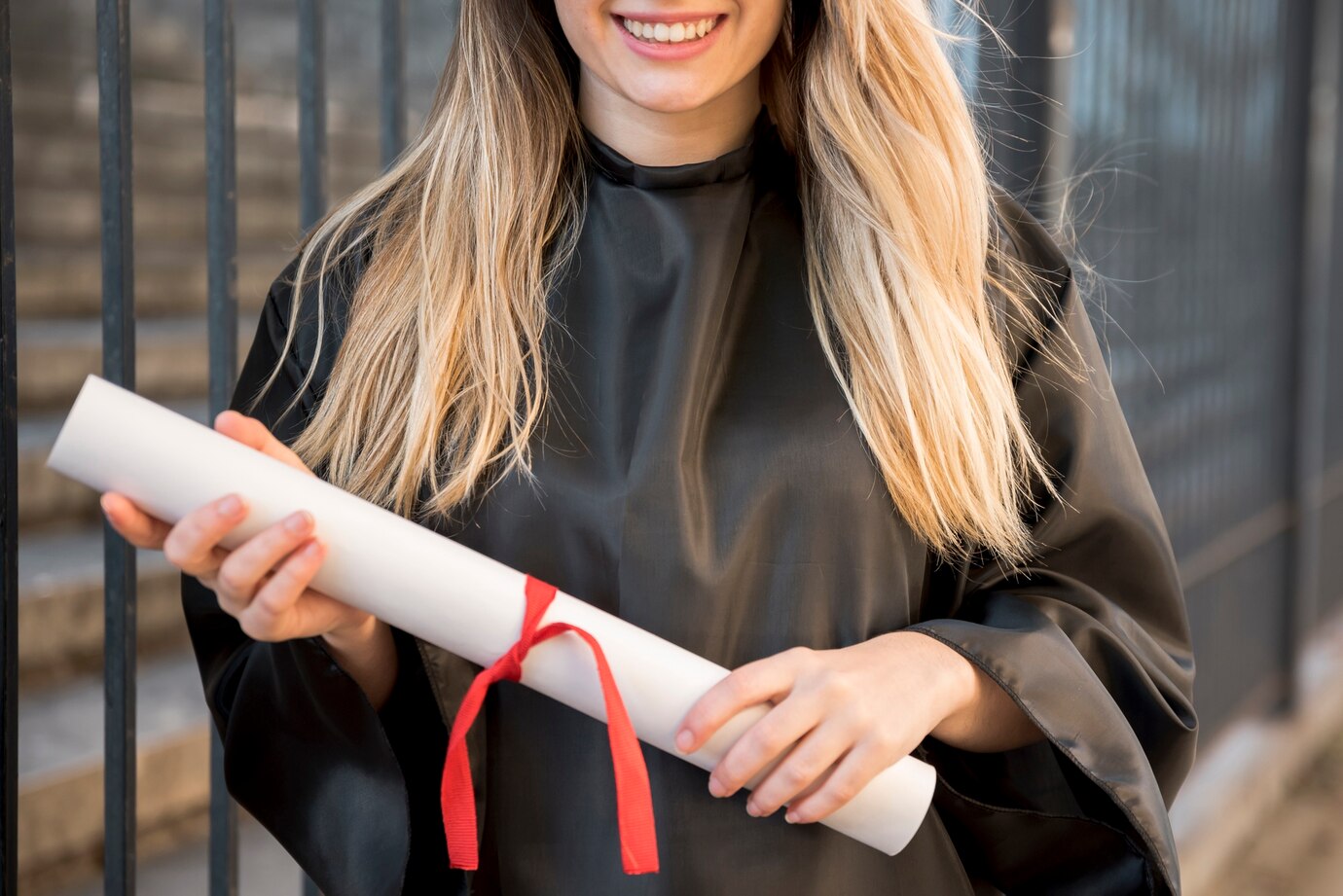front_view_girl_smiling_holding_her_certificate_23_2148232761.jpg