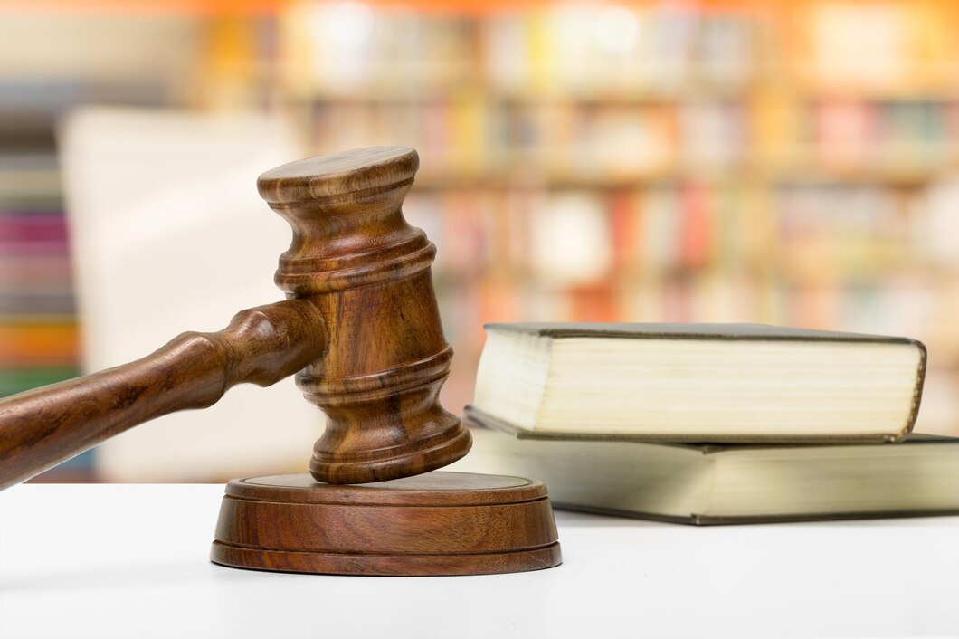 wooden-gavel-books-wooden-table_93675-130700.jpg
