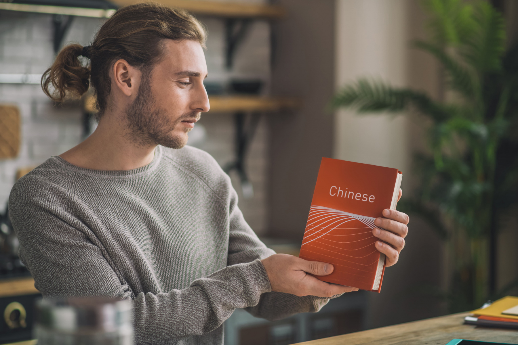 young-handsome-man-studying-chinese-at-home-2021-09-04-02-24-03-utc.jpg